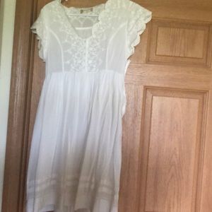 White dress with white embroidery detailing